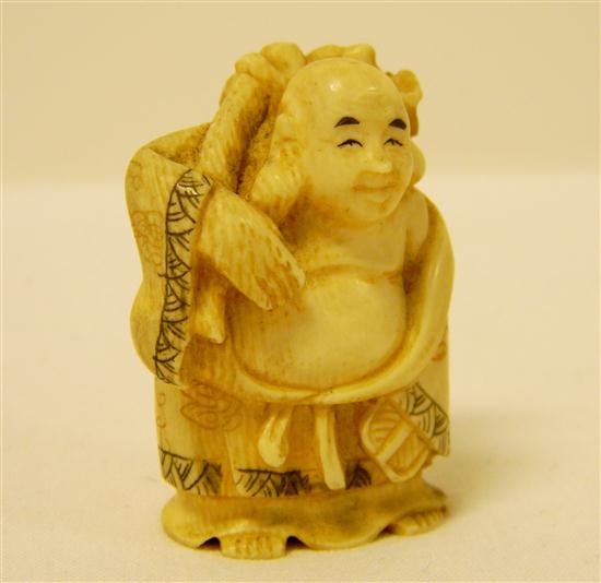 Ivory carving of Hotai carrying a