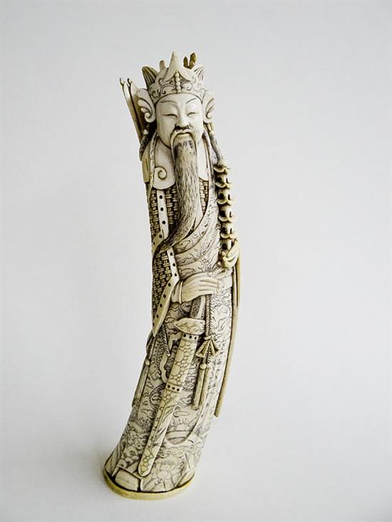 IVORY FIGURE OF ARMORED SOLDIER. 