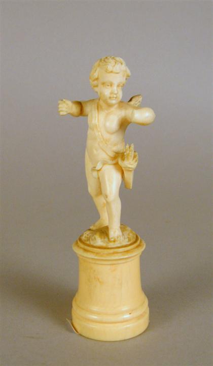Ivory figure of Cupid    late