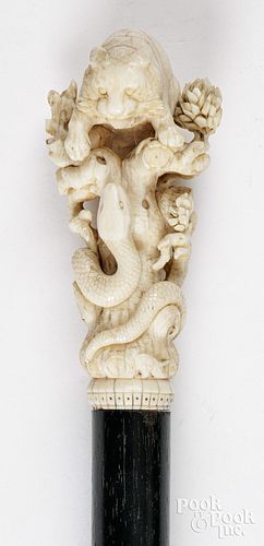 IVORY LION AND SNAKE WALKING