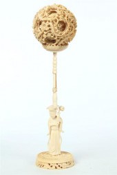 IVORY PUZZLE BALL AND STAND.