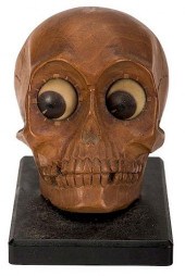 J. OSWALD ROTATING EYES SKULL