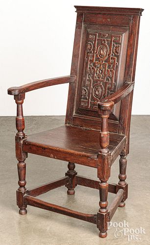 JACOBEAN CARVED OAK ARMCHAIR,