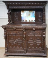 JACOBEAN STYLE CARVED OAK TWO-