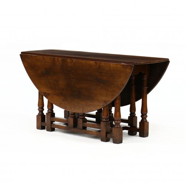 JACOBEAN STYLE OAK DROP LEAF DINING