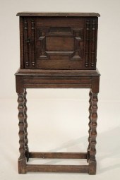 JACOBEAN STYLE OAK FITTED CABI