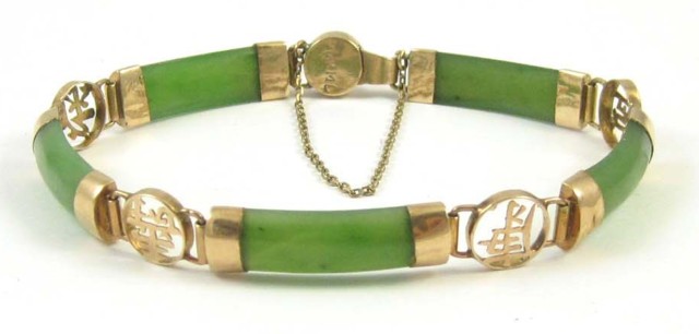 JADE AND FOURTEEN KARAT GOLD