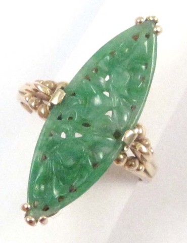JADE AND FOURTEEN KARAT GOLD RING