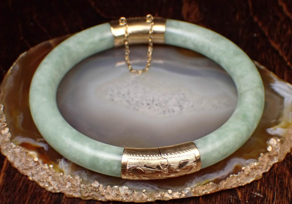 JADE AND FOURTEEN KARAT GOLD BANGLE
