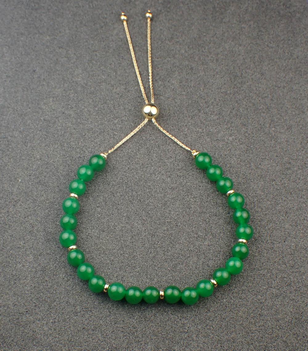 JADE AND FOURTEEN KARAT GOLD