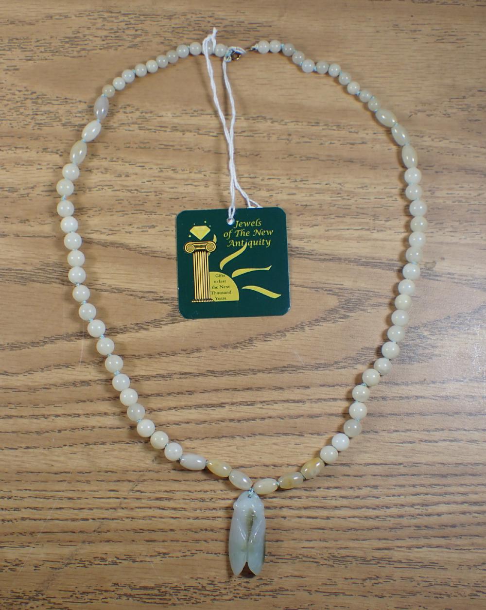 JADE AND FOURTEEN KARAT GOLD