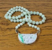 JADE AND FOURTEEN KARAT GOLD B