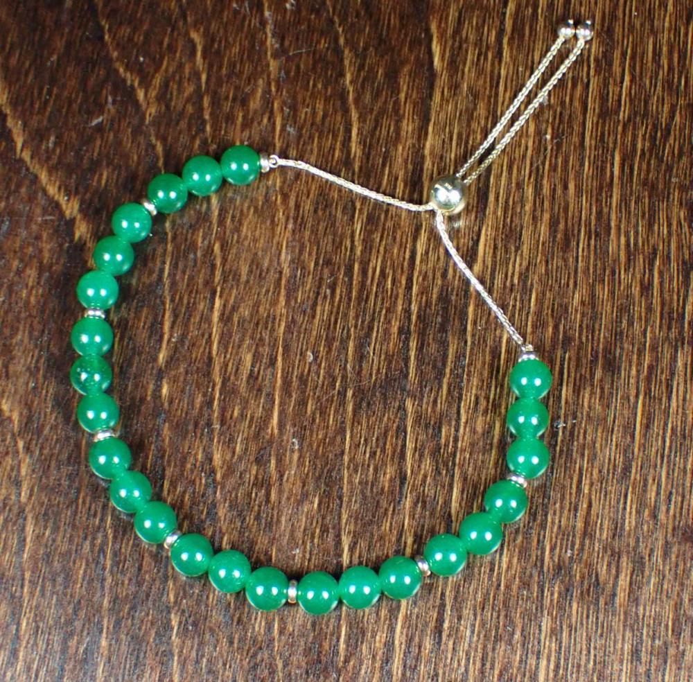 JADE AND FOURTEEN KARAT GOLD