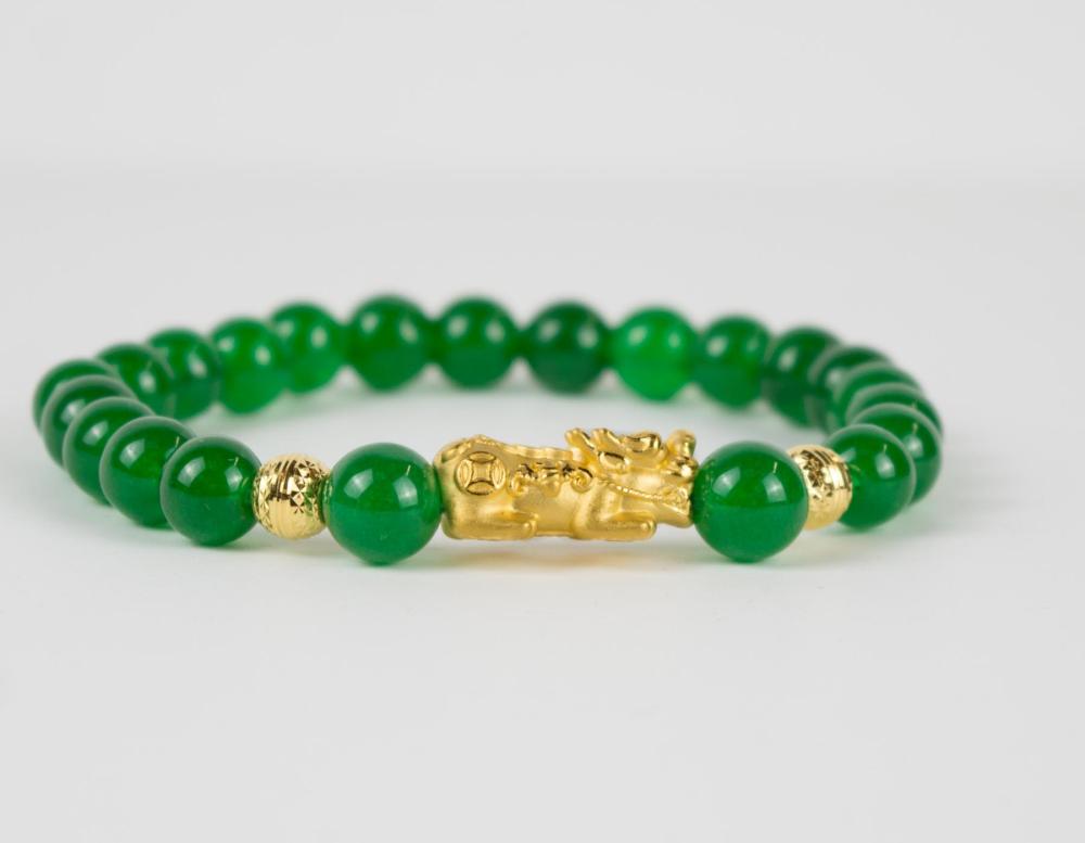 JADE AND TWENTY-FOUR KARAT GOLD