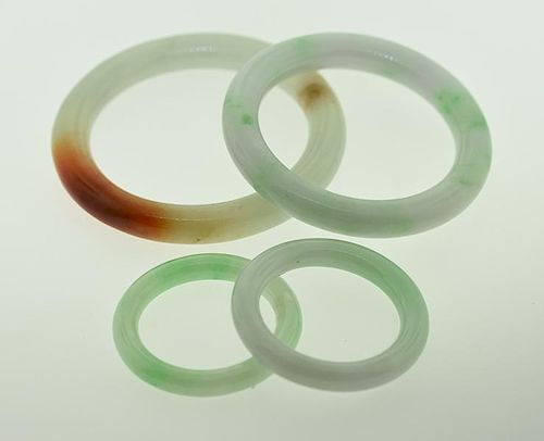 JADE BANGLESFour Chinese jade