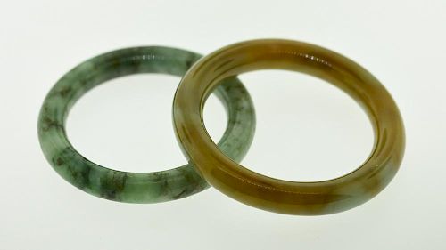JADE BANGLESTwo jade bangles in