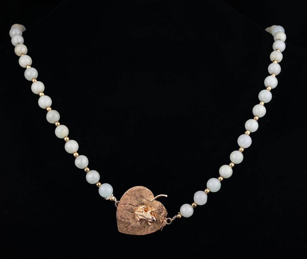 JADE BEAD AND 14 KT. GOLD PENDANT