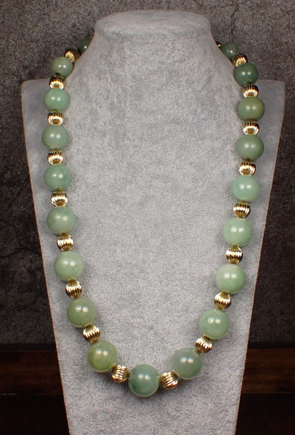 JADEITE JADE AND FOURTEEN KARAT