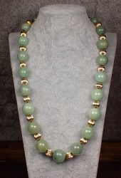 JADEITE JADE AND FOURTEEN KARA