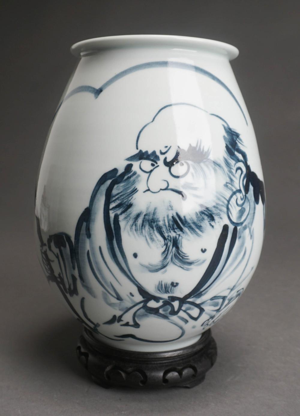 JAPANESE BLUE AND WHITE VASE ON