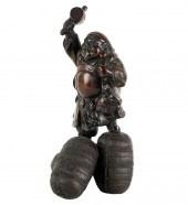 JAPANESE BRONZE FIGUREon an in