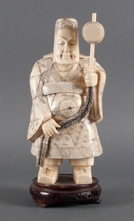 Japanese carved bone deity figure