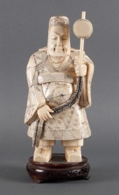 Japanese carved bone deity fig