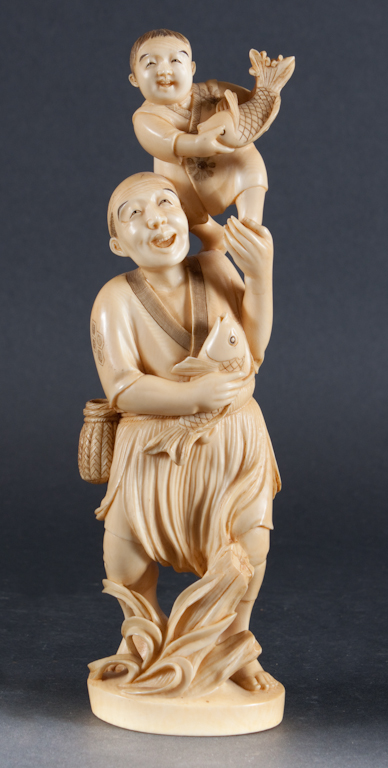Japanese carved ivory figure of a