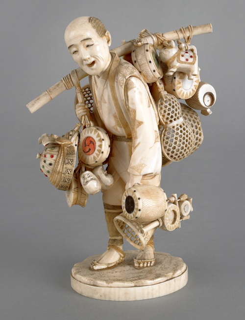 Japanese carved ivory figure of a