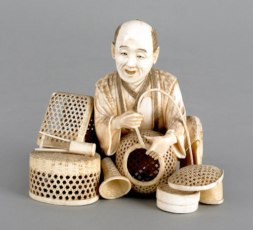 Japanese carved ivory figure of a