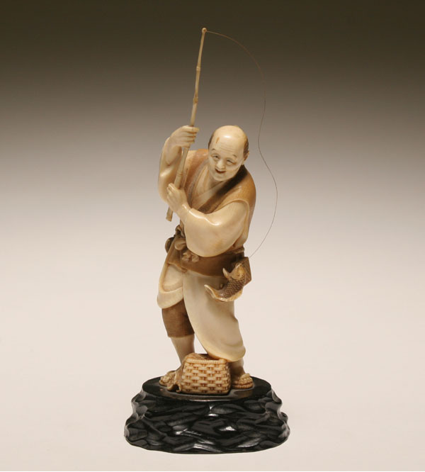 Japanese carved ivory figure of a