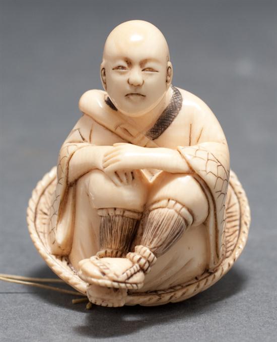 Japanese carved ivory netsuke: