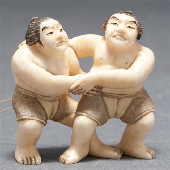 Japanese carved ivory netsuke: pair