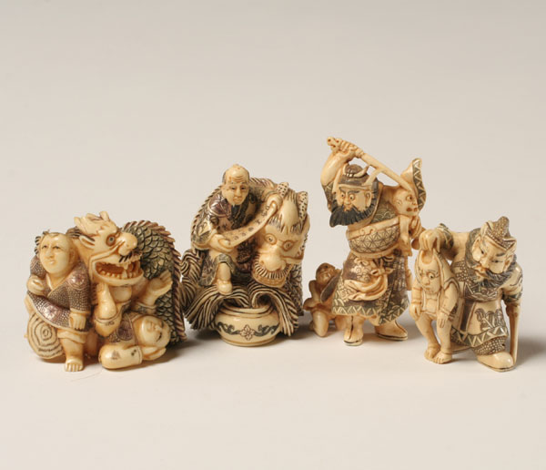 Japanese carved ivory netsukes, men