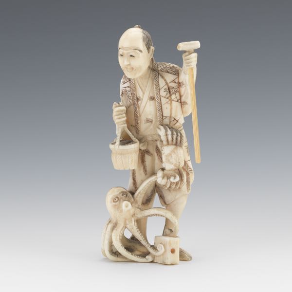 JAPANESE CARVED WHALE TOOTH OKIMONO