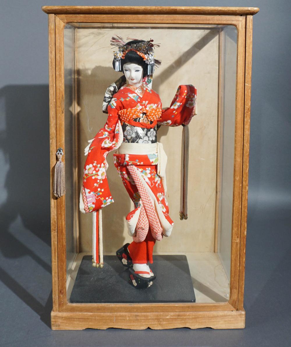 JAPANESE GEISHA DOLL IN DISPLAY