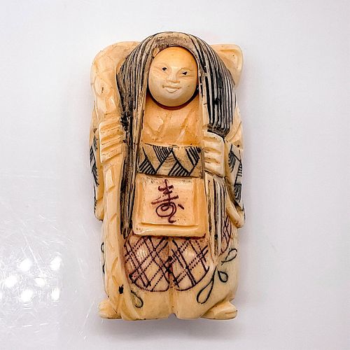 JAPANESE INKED CARVED BONE ROTATING