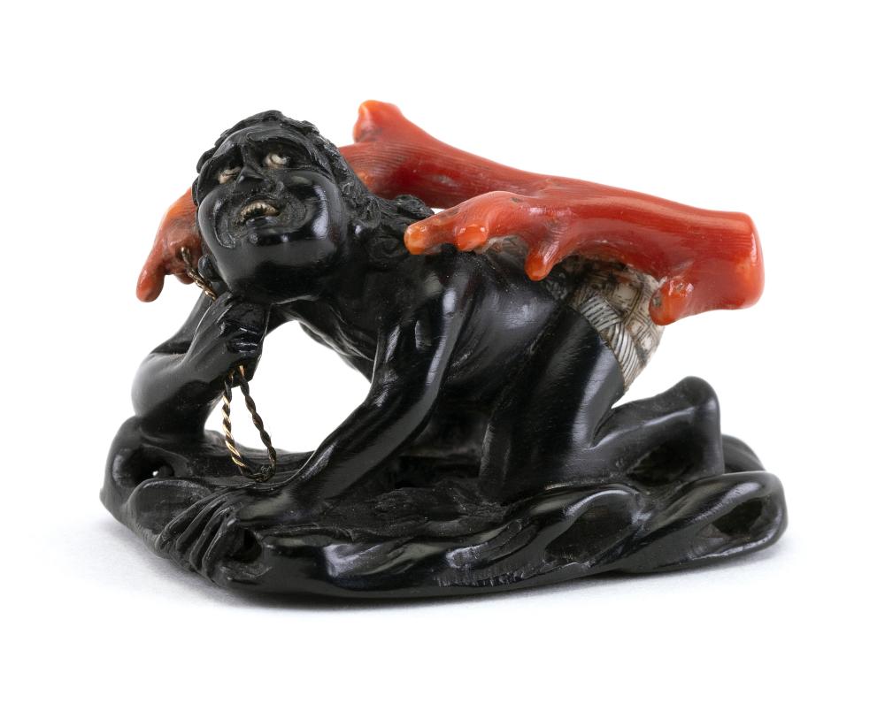 JAPANESE INLAID EBONY NETSUKE BY
