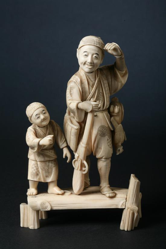 JAPANESE IVORY OKIMONO OF HUNTER