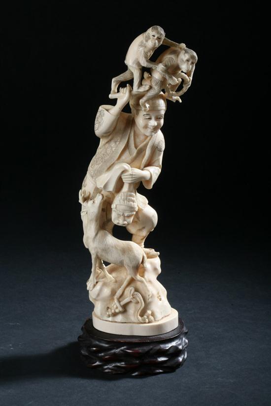 JAPANESE IVORY OKIMONO OF MAN