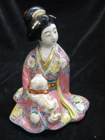 Japanese Porcelain Figurine of a