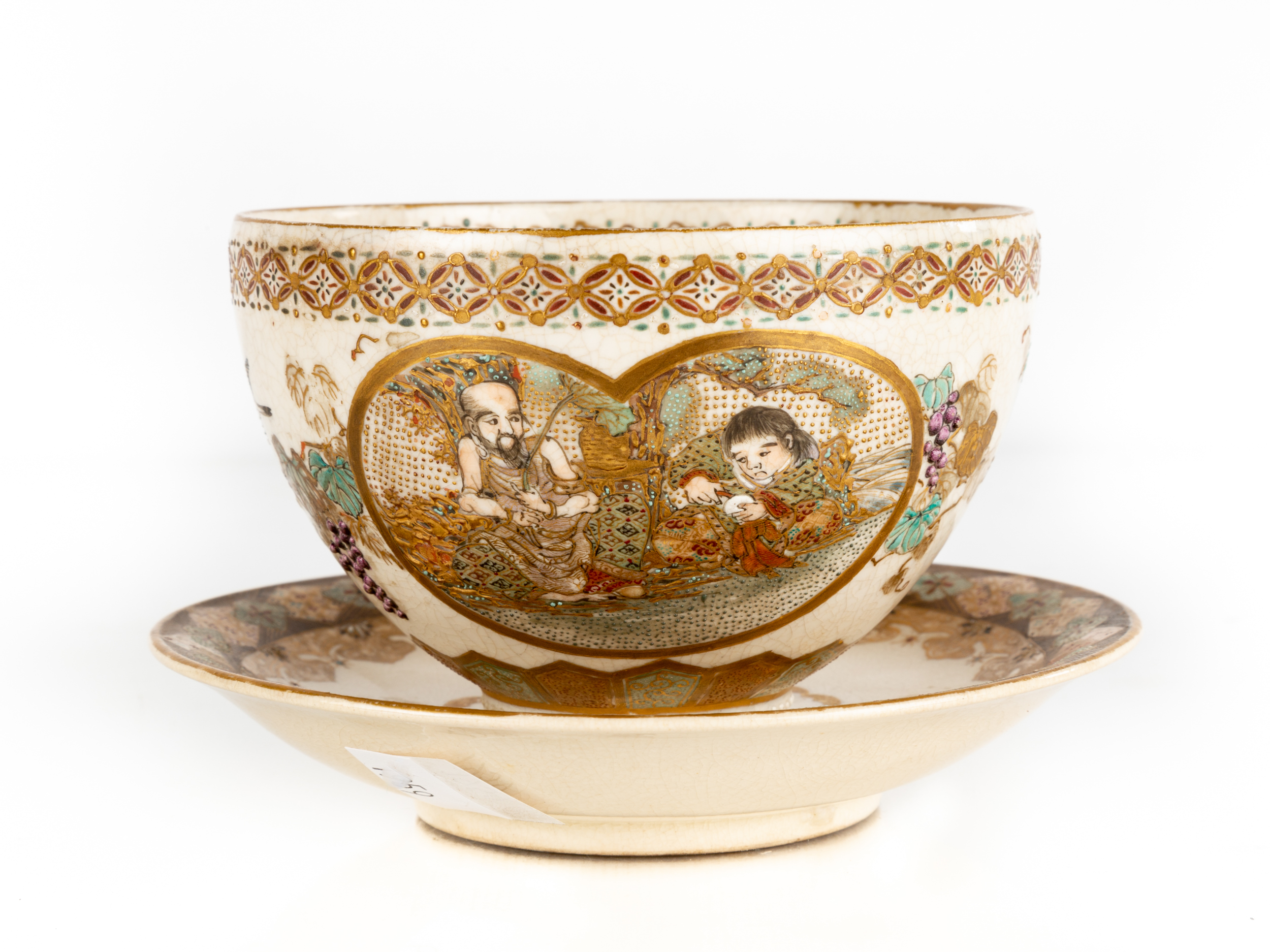 JAPANESE SATSUMA TEA CUP AND SAUCER