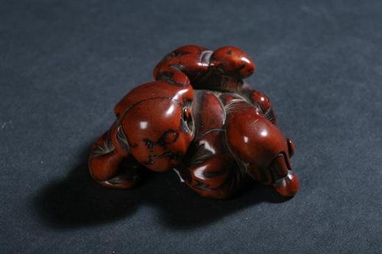 JAPANESE WOOD NETSUKE OF MAN