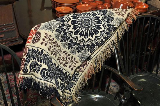 JAQUARD COVERLET. In navy blue 