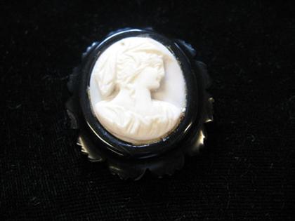 Jet and ivory cameo brooch   