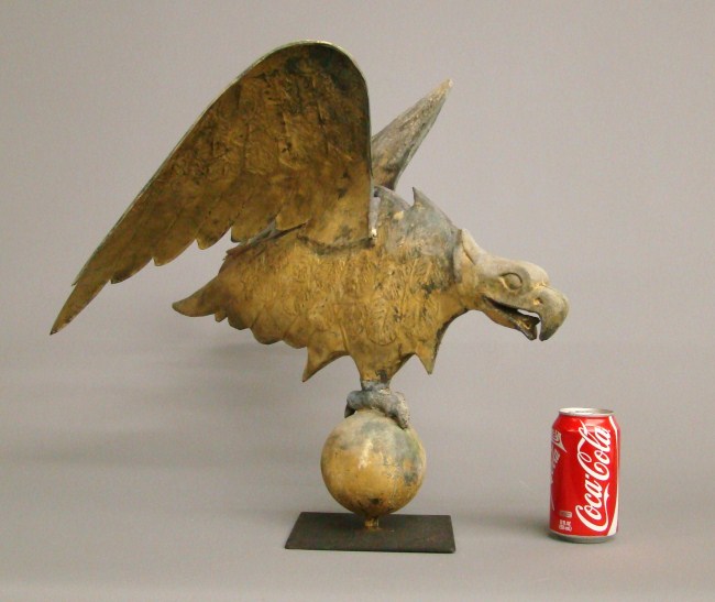 Jewel type eagle on ball