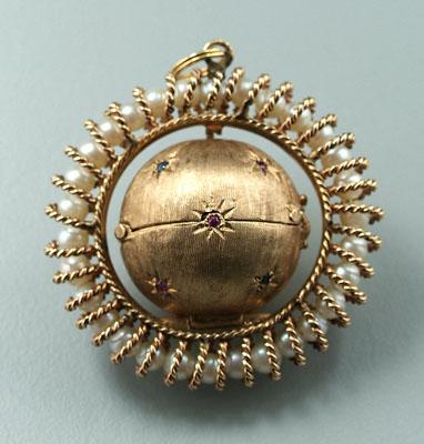Jeweled gold locket, textured
