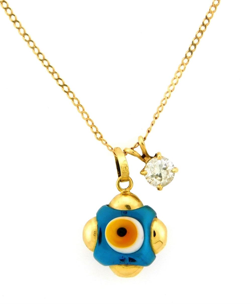 JEWELRY: 14K ENAMELED BEAD AND