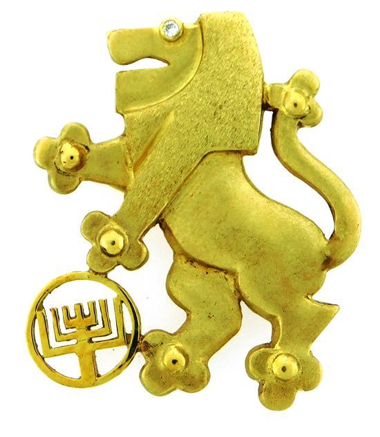 JEWELRY: 14K STAMPED LION OF
