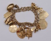 JEWELRY. 14KT GOLD CHARM BRACE